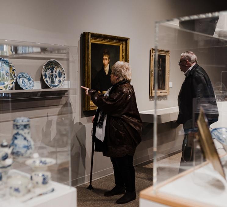 A couple explores the collections at the Art Gallery of Greater Victoria in Victoria, BC