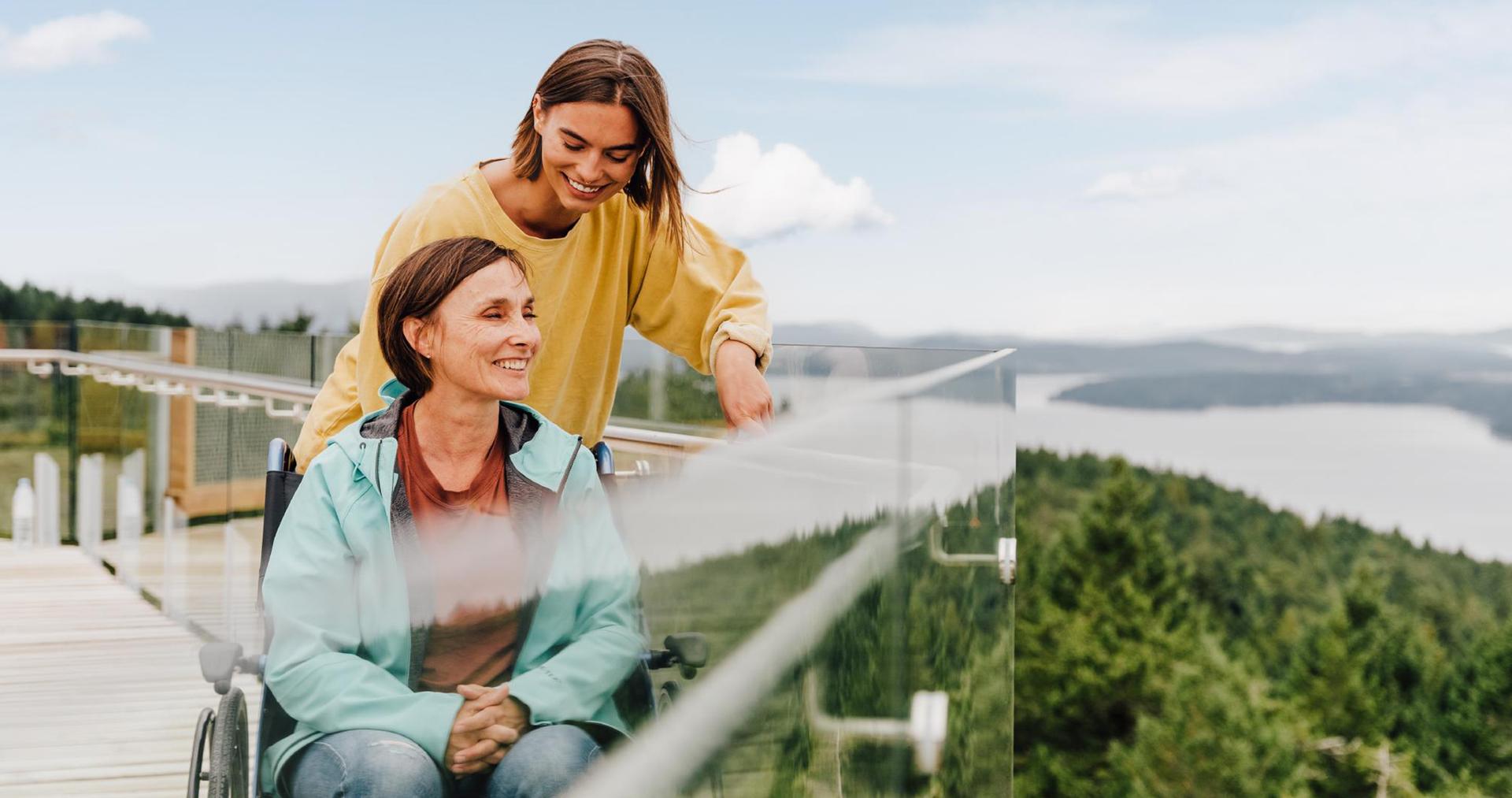 A mother and daughter take in the views at the top of the Malahat SkyWalk in Victoria, BC
