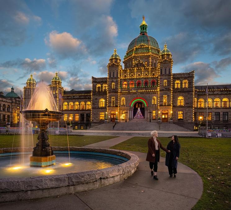 The BC Parliament Buildings illuminated at sunset