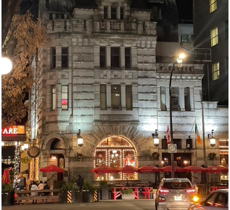 The exterior of the Irish Times at night in Victoria, BC