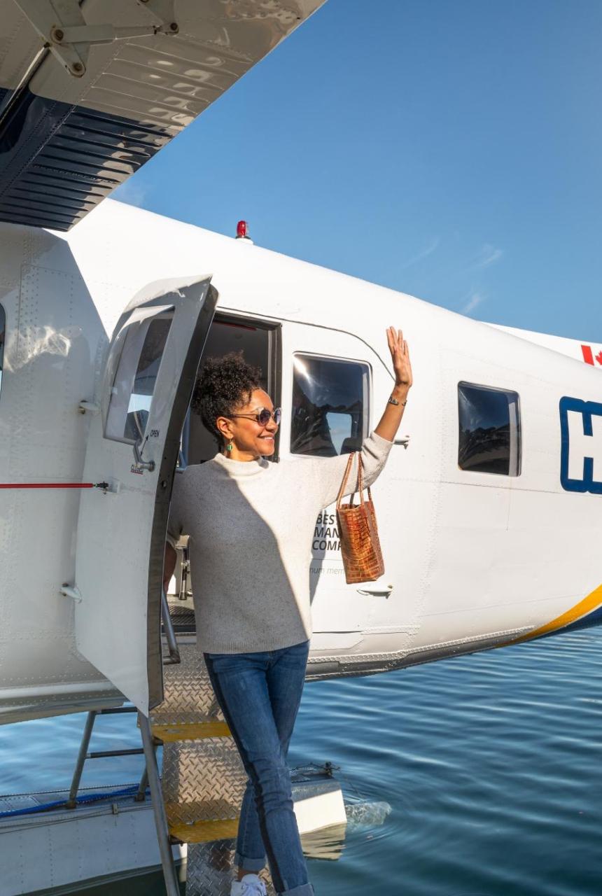 A woman leaving a Harbour Seaplane in Victoria, BC