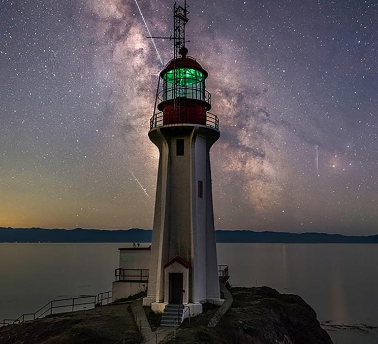 The milky way in the sky behind the Sheringham Point Lighthouse in Victoria, BC