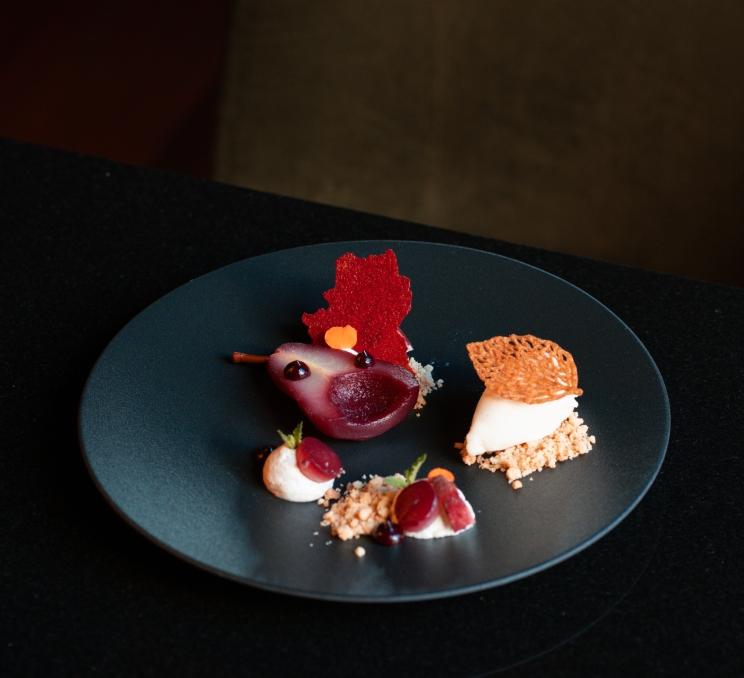 A beautifully plated dessert at The Bengal, made to look like a small bird.