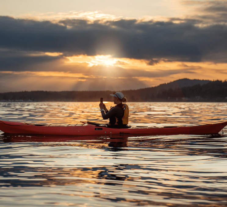 A kayaker in the water in Sidney, BC
