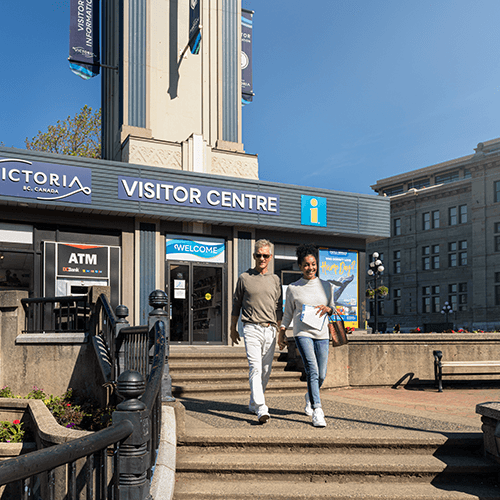 People exiting the Visitor Centre in Victoria, BC